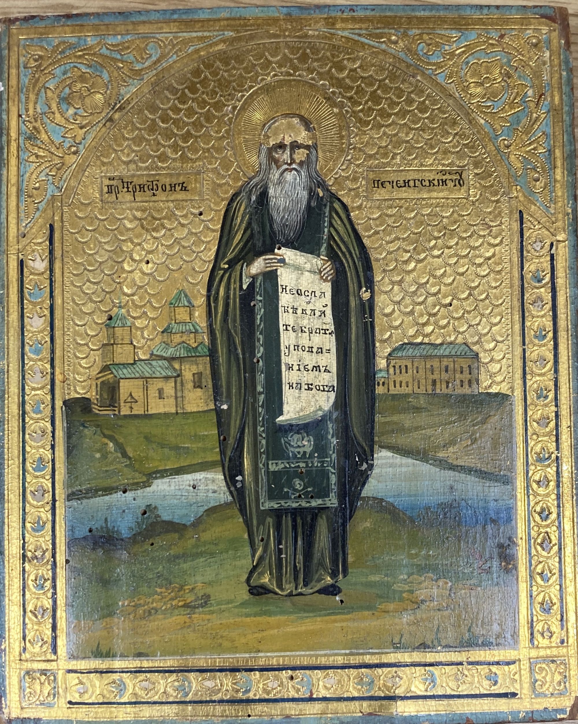 Russian School, tempera on panel, Icon with standing saint, 18 x 14.5cm